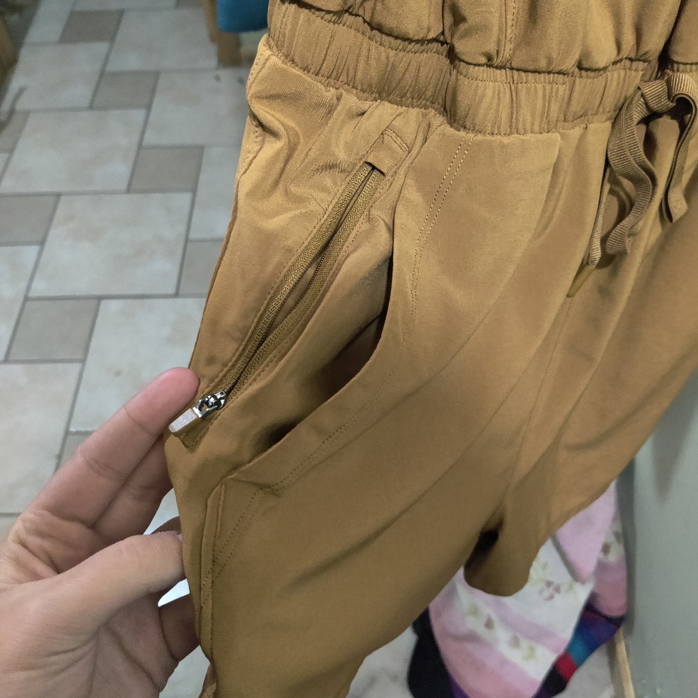 I am selling a caramel colored sports romper.